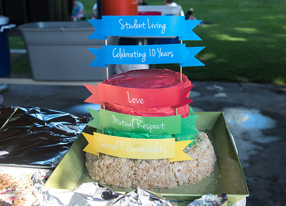 Student Living department employees and their families enjoy a picnic at Smith Park, to celebrate 10 years of being an organization.
