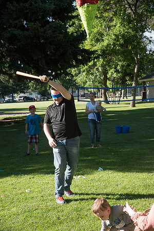 Student Living department employees and their families enjoy a picnic at Smith Park, to celebrate 10 years of being an organization.