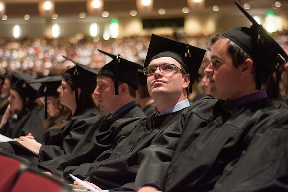BYU-Idaho Graduates listen to the opening remarks at the commencement ceremony. Photo by Ryan Chase