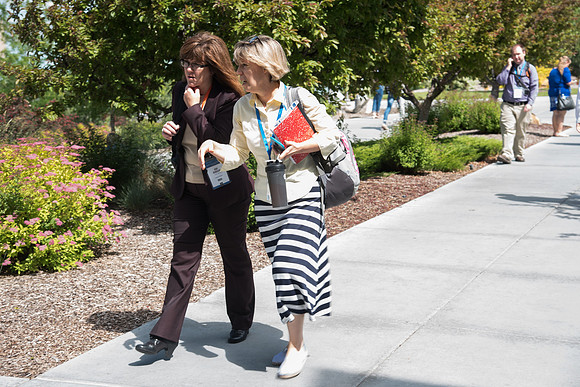 Online Instructors outside the Taylor Building before the last Keynote Address begins.