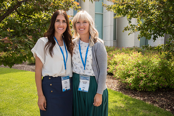 Online Instructors outside the Taylor Building before the last Keynote Address begins.