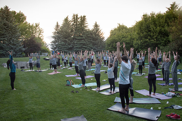 Students participate in the Yogathon activity in the Ricks Gardens on the BYU-Idaho Campus.