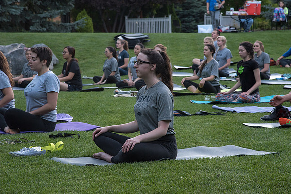 Students participate in the Yogathon activity in the Ricks Gardens on the BYU-Idaho Campus.