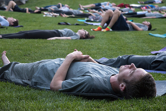 Students participate in the Yogathon activity in the Ricks Gardens on the BYU-Idaho Campus.