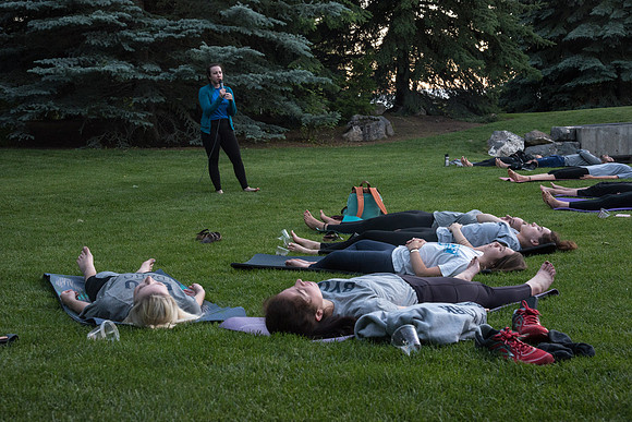 Students participate in the Yogathon activity in the Ricks Gardens on the BYU-Idaho Campus.