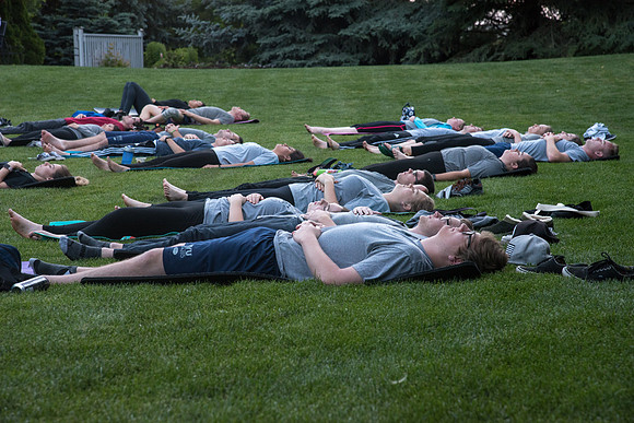 Students participate in the Yogathon activity in the Ricks Gardens on the BYU-Idaho Campus.