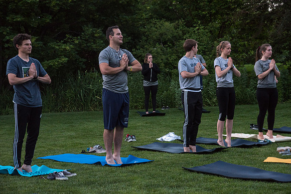 Students participate in the Yogathon activity in the Ricks Gardens on the BYU-Idaho Campus.