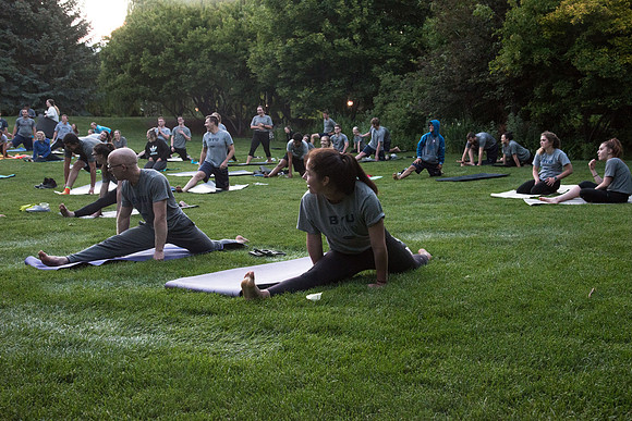 Students participate in the Yogathon activity in the Ricks Gardens on the BYU-Idaho Campus.