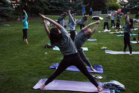 Students participate in the Yogathon activity in the Ricks Gardens on the BYU-Idaho Campus.