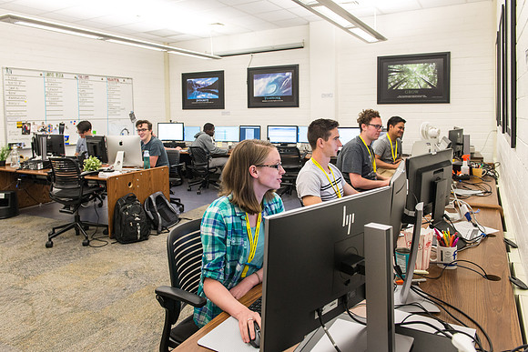 Student employees in the Faculty Technology Center are trained to help faculty with their technology questions.