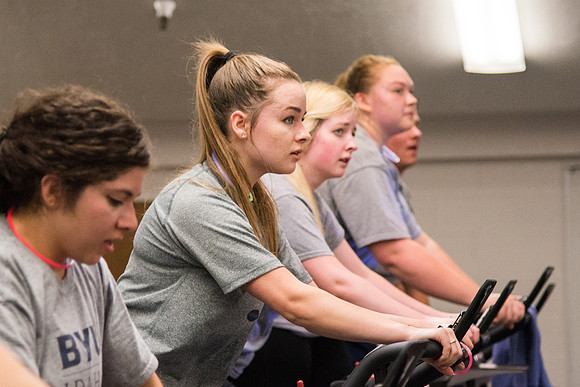 Students attend Cosmic Cycling Class at the Hart building.