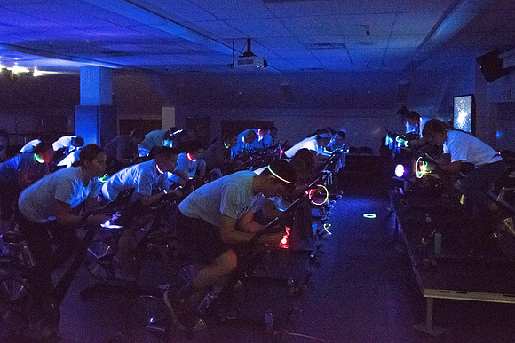 Students attend Cosmic Cycling Class at the Hart building.