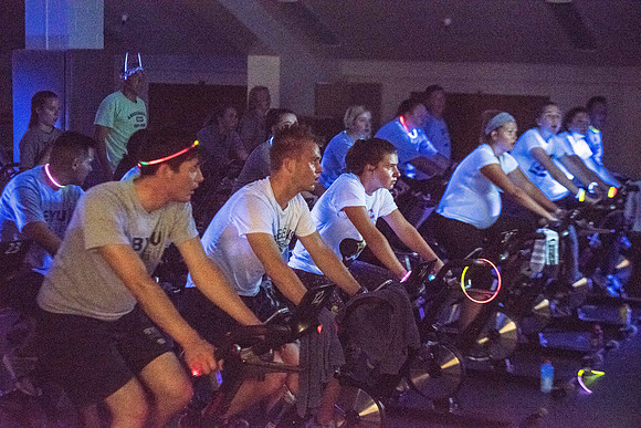 Students attend Cosmic Cycling Class at the Hart building.