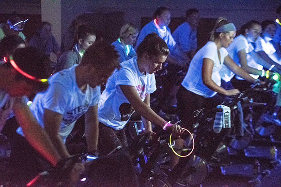 Students attend Cosmic Cycling Class at the Hart building.