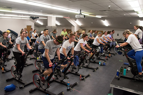 Students attend Cosmic Cycling Class at the Hart building.
