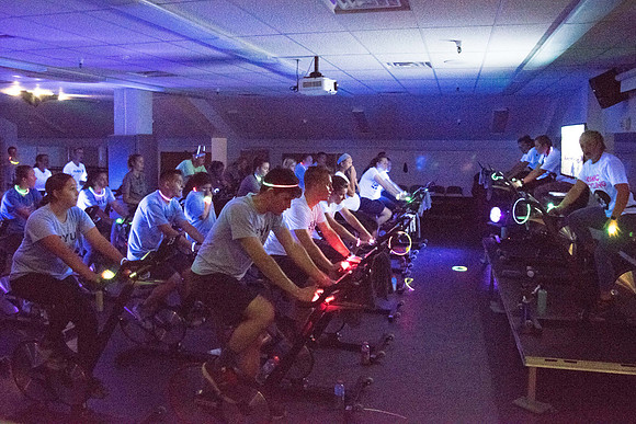 Students attend Cosmic Cycling Class at the Hart building.