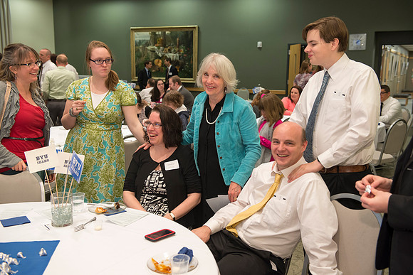 Online Leaning Graduates gather in the MC Special Events room for a reception.