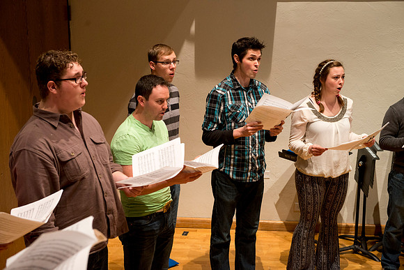 Students sing under the direction of Brother Randall Kempton in the Collegiate Singers ensemble.