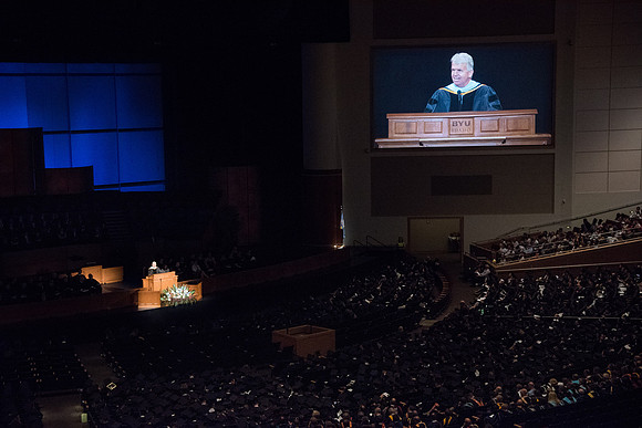 Brother Douglas D. Holmes, First Counselor in the Young Men General Presidency speaks at Commencement Services in the BYU-Idaho Center.