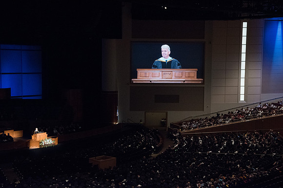 Brother Douglas D. Holmes, First Counselor in the Young Men General Presidency speaks at Commencement Services in the BYU-Idaho Center.