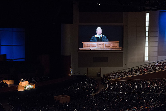 Brother Douglas D. Holmes, First Counselor in the Young Men General Presidency speaks at Commencement Services in the BYU-Idaho Center.