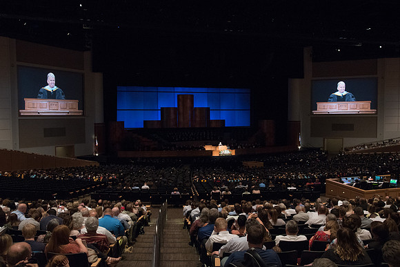 Brother Douglas D. Holmes, First Counselor in the Young Men General Presidency speaks at Commencement Services in the BYU-Idaho Center.