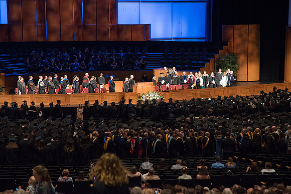 Graduates during the Recessional after Commencement Services in the BYU-Idaho Center.