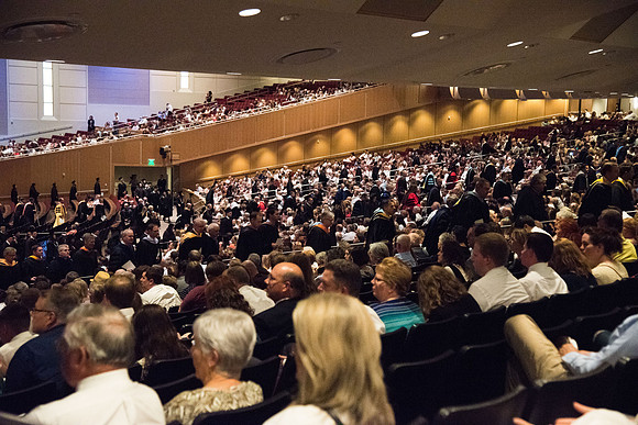 Graduates during the Recessional after Commencement Services in the BYU-Idaho Center.