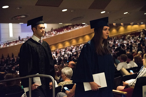 Graduates during the Recessional after Commencement Services in the BYU-Idaho Center.