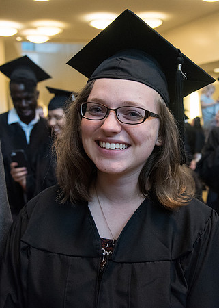 Lauren Hamill smiles for a photo after Commencement in the BYU-Idaho Center.