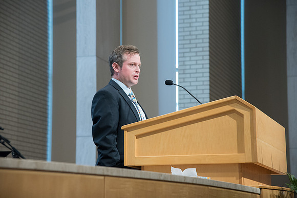 Will Geirke, Alumni Representative speaks at the Convocation of the Home and Family in the Taylor Chapel.