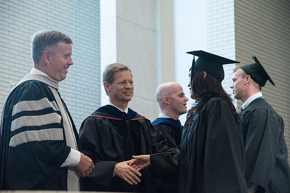 Awarding of Diplomas to graduates at the Home and Family Convocation in the Taylor Chapel.