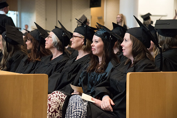 Awarding of Diplomas to graduates at the Home and Family Convocation in the Taylor Chapel.