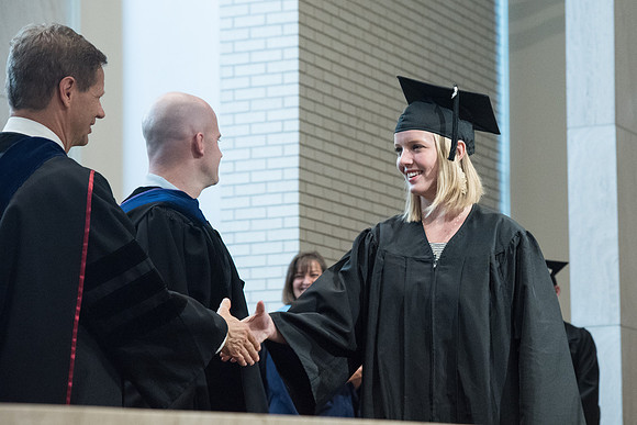 Awarding of Diplomas to graduates at the Home and Family Convocation in the Taylor Chapel.