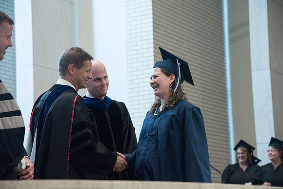Awarding of Diplomas to graduates at the Home and Family Convocation in the Taylor Chapel.