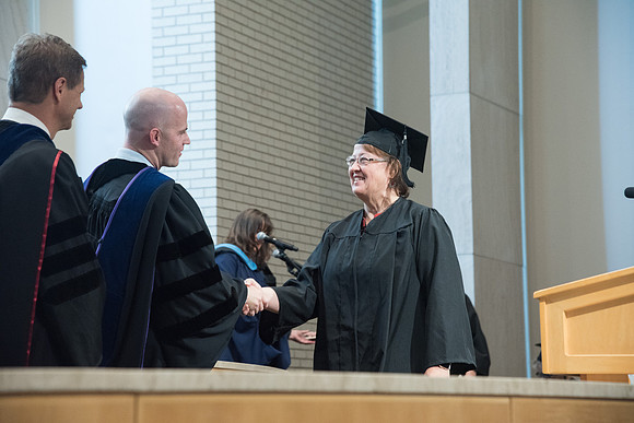 Awarding of Diplomas to graduates at the Home and Family Convocation in the Taylor Chapel.