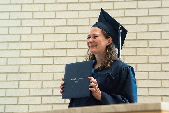 Awarding of Diplomas to graduates at the Home and Family Convocation in the Taylor Chapel.