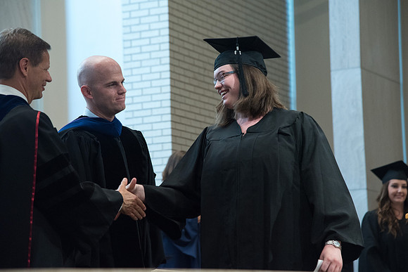 Awarding of Diplomas to graduates at the Home and Family Convocation in the Taylor Chapel.