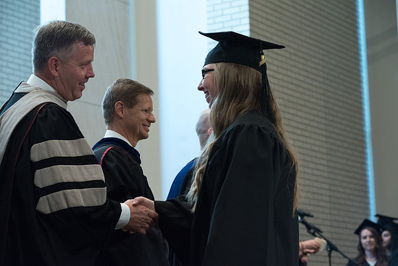 Awarding of Diplomas to graduates at the Home and Family Convocation in the Taylor Chapel.
