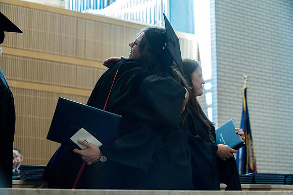 Awarding of Diplomas to graduates at the Home and Family Convocation in the Taylor Chapel.