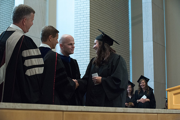 Awarding of Diplomas to graduates at the Home and Family Convocation in the Taylor Chapel.