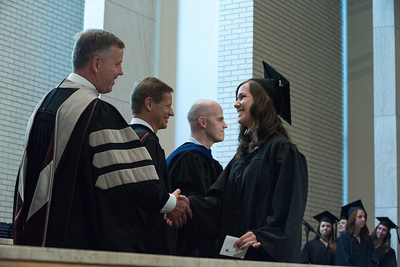 Awarding of Diplomas to graduates at the Home and Family Convocation in the Taylor Chapel.