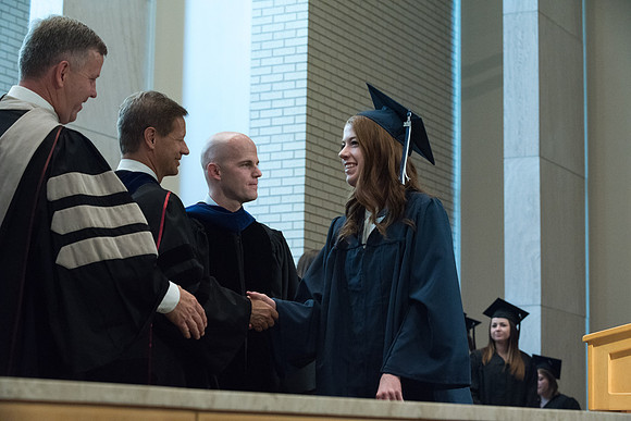Awarding of Diplomas to graduates at the Home and Family Convocation in the Taylor Chapel.