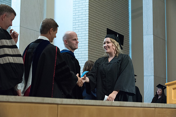 Awarding of Diplomas to graduates at the Home and Family Convocation in the Taylor Chapel.