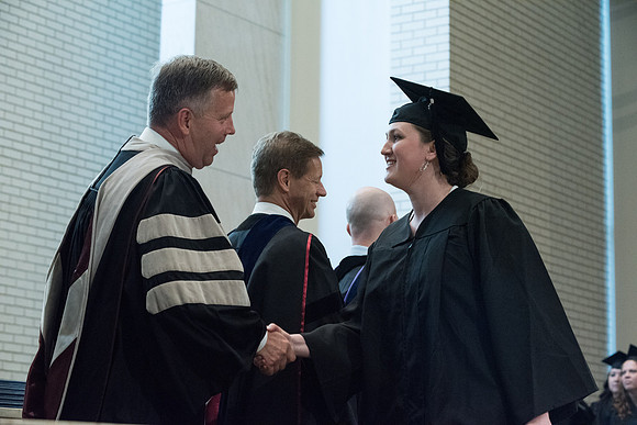 Awarding of Diplomas to graduates at the Home and Family Convocation in the Taylor Chapel.