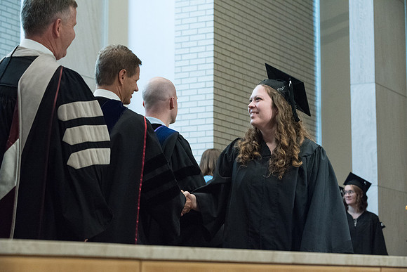 Awarding of Diplomas to graduates at the Home and Family Convocation in the Taylor Chapel.