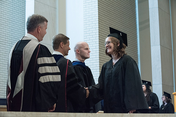 Awarding of Diplomas to graduates at the Home and Family Convocation in the Taylor Chapel.