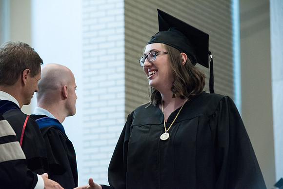 Awarding of Diplomas to graduates at the Home and Family Convocation in the Taylor Chapel.