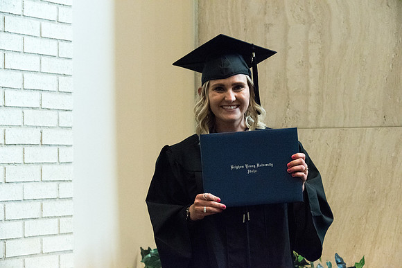 Awarding of Diplomas to graduates at the Home and Family Convocation in the Taylor Chapel.