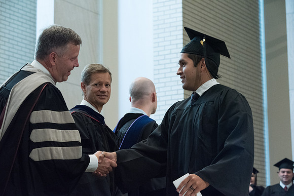 Awarding of Diplomas to graduates at the Home and Family Convocation in the Taylor Chapel.